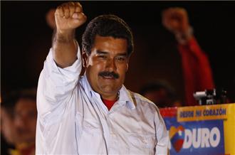 Nicolas Maduro, a protege of former Venezuelan President Hugo Chavez, narrowly won election on Sunday. (Reuters)