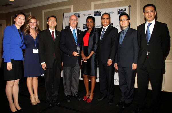 ICN founder Felicia Persaud, 4th from right, with Mike Ronan, vice president of government relations for the Caribbean, Latin America and Asia at RCCL, 4th from left; Miguel Reyna, director, Port Business Development and Asset Management, 3rd from righ; Kara Coleman, news anchor of One Caribbean Television and ICN 2013 emcee, 2nd from left and the China and the Caribbean panellists including Li Li at left; Consul in charge of economic and commercial affairs of the Consulate General of China in New York, Xiaoguang Liu; 3rd from right and Johnny Liu of the American Chinese Commerce Development Association at right. (Photo: Hayden Roger Celestin)