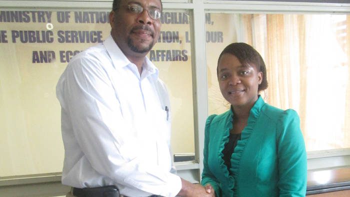 Chair of the National Reconciliation Advisory Committee, Pastor Stephen Ollivierre, left, and Leader of the Democratic Republican Party, Anesia Baptiste.