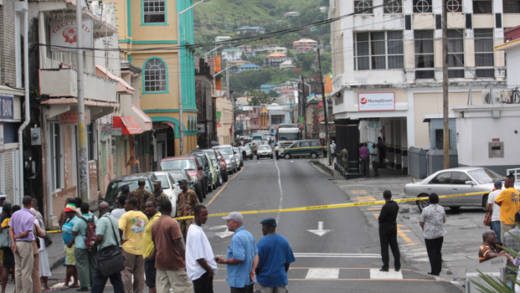 A postal worker was robbed of  EX$100,000 and a police officer shot in Kingstown on June 13, 2013. (IWN photo)