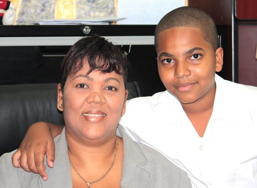 The top performer in this year's Common Entrance Examination, Gian-Paul Baker and his mother, Nicole Bonadie-Baker. (IWN photo)