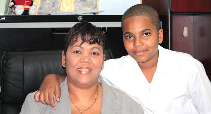The top performer in this year's Common Entrance Examination, Gian-Paul Baker and his mother, Nicole Bonadie-Baker. (IWN photo)