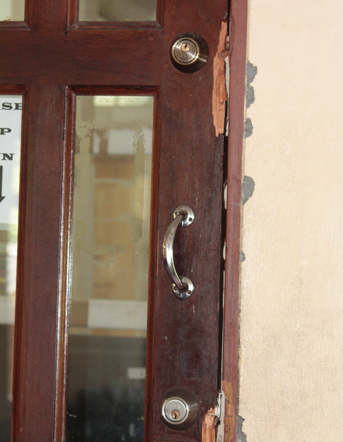 The burglars broke the locks off this door to an office inside the building. (IWN photo)
