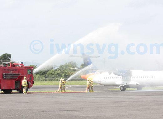 The new LIAT ATR 72-600 gets the traditional water salute on its inaugural flight to St. Vincent on Wednesday, June 26, 2013. 