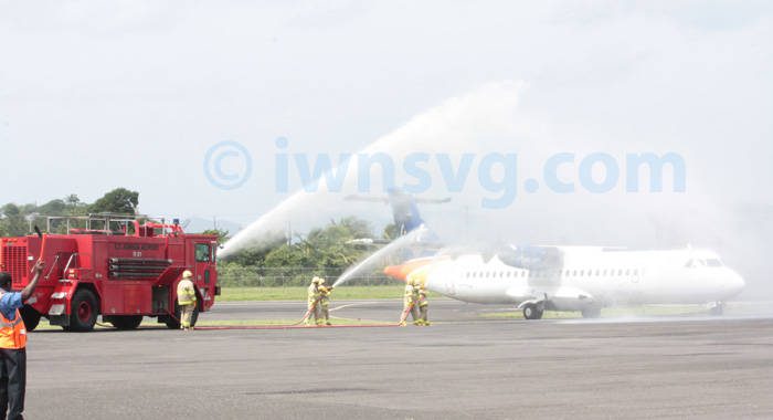 The new LIAT ATR 72-600 gets the traditional water salute on its inaugural flight to St. Vincent on Wednesday, June 26, 2013. 