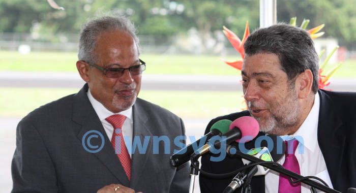 Prime Minister Dr. Ralph Gonsalves introduces Ian Brunton, chief executive officer of LIAT at a ceremony on in St. Vincent to welcome LIAT's first ATR aircraft to the country on June 26, 2013. 