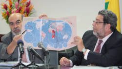 Director-General of the FAO, José Graziano da Silva, right, notes that on the FAOs map, St. Vincent and the Grenadines, is in white, among nations that have 5 per cent of their population undernourished. Prime Minister Dr. Ralph Gonsalves is at left. (IWN photo) 