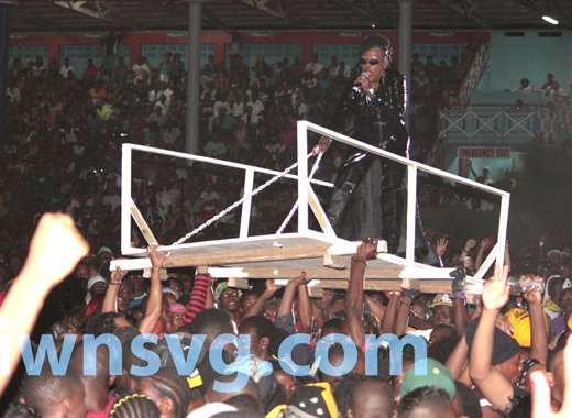 Fya Empress is carried above head as she begins her performance at Soca Monarch on Saturday, July 6, 2013.