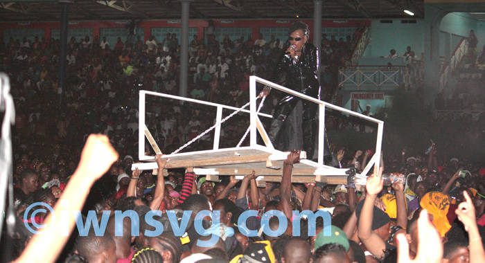 Fya Empress is carried above head as she begins her performance at Soca Monarch on Saturday, July 6, 2013.