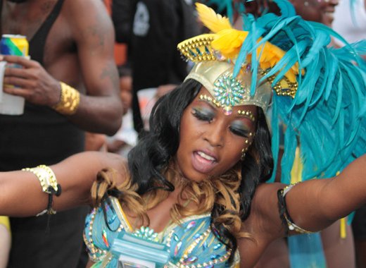 A masquerader dances in Kingstown on Tuesday evening, July 9, 2013, as carnival activities climax. (IWN photo) 