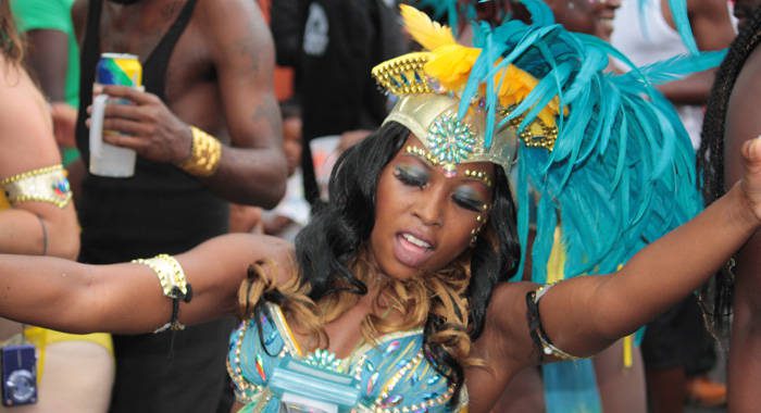 A masquerader dances in Kingstown on Tuesday evening, July 9, 2013, as carnival activities climax. (IWN photo) 