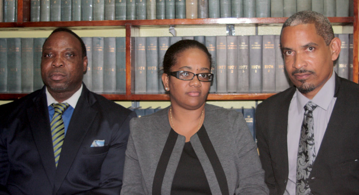 Senator Vynnette Frederick, centre, with lawyers Keith Scotland, left, and Andrew Pilgrim after her release on Thursday, July 11, 2013. (IWN photo)