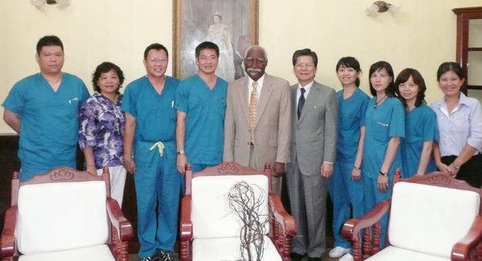 The medical team from the Changhua Christian Hospital in Taiwan poses with Governor General Sir Frederick Ballantyne and Taiwan Ambassador to SVG, Weber Shih. 