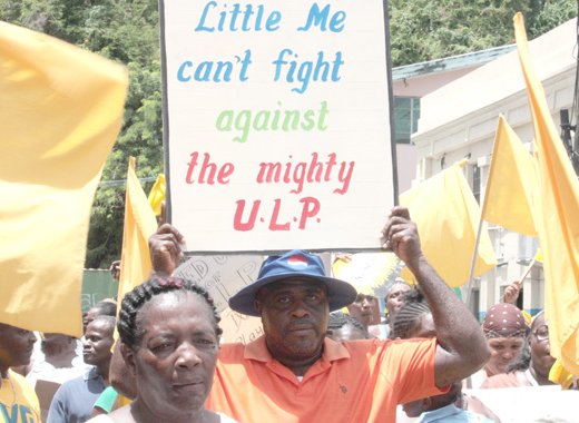 Businessman Leon Bigger Biggs Samuel participates in an opposition protest on July 26, 2013 He said on Monday that he wants a meeting with the government regarding a revoked mining licence. (IWN photo)