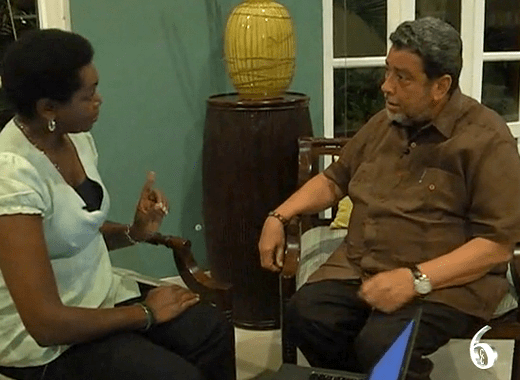 Journalist Beverly Sinclair and Prime Minister Dr. Ralph Gonsalves.