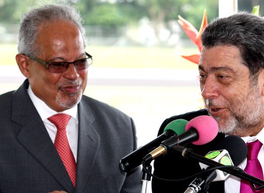 Former CEO of LIAT, Ian Brunton, left, and Prime Minister Dr. Ralph Gonsalves. (IWN file photo)