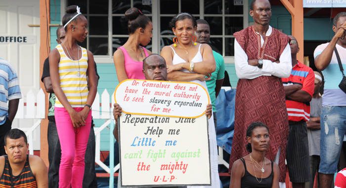 Leon "Bigger Bigs" Samuel protests at the opening of the Reparations Conference last year. He was arrested in Kingstown on Monday. (IWN photo)