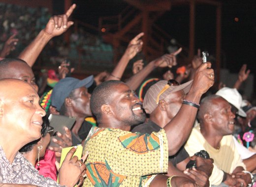 Persons enjoy a performance by Jamaican reggae artiste, Bunny Wailer at the opening of the Regional Reparations Conference on Sunday. (IWN photo)