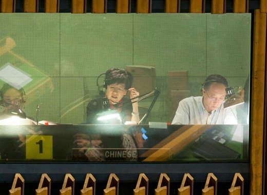 United Nations interpreters at work during the opening of the general debate of the General Assembly's sixty-seventh session. (2012) UN Photo/JC McIlwaine