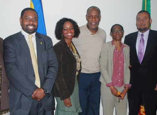 Ambassador Prince and some Embassy staff welcome Danny Glover and James Early.