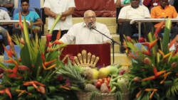 President of Guyana, Donald Romatar, is framed by agriculture décor as he addresses the opening ceremony of CWA 2013. (Photo: Kenton X. Chance)