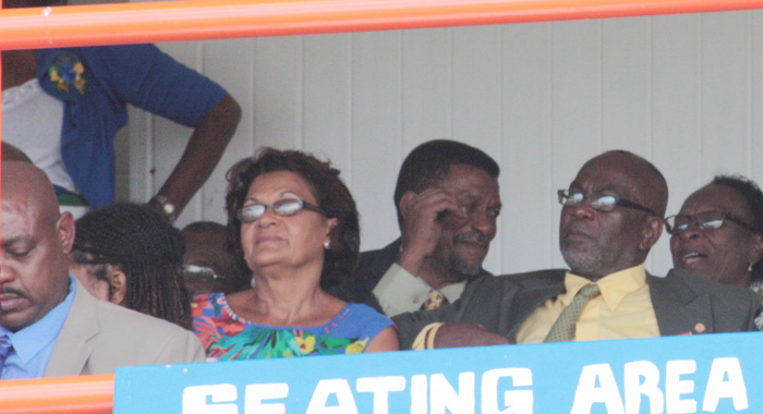 Opposition MP, St. Clair Leacock, front right, and his wife Margaret Leacock, to his left, at the Parade on Sunday. (IWN photo)