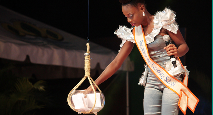 Second Runner-up: Terreka Nero of the Buccament Bay Secondary picks a heritage question. (IWN photo)