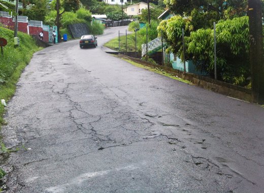 Works on the upgrade of the South Leeward Highway, which includes this span in Rillan Hill, begins January 2014. (IWN photo) 