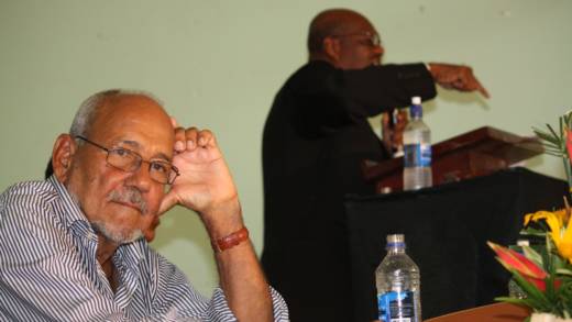 Sir James Mitchell at the NDP convention in 2010 as then party president, Arnhim Eustace delivers and address. The two have been hostile to each other publicly. (IWN photo)