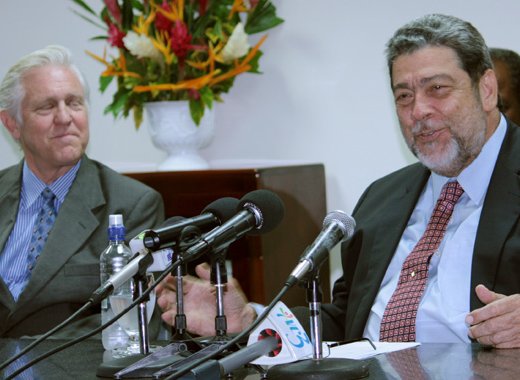 Jan Hartke of the Clinton Climate Initiative, left, and Prime Minister Dr. Ralph Gonsalves. (IWN photo)