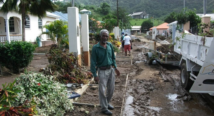 Ivan O'neal visits areas affected by floods. (Green Party photo)