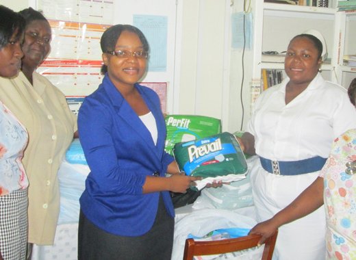 DRP hopeful for West St. George, Anesia Baptiste, with nurses and other staff of the Belair Community Clinic.