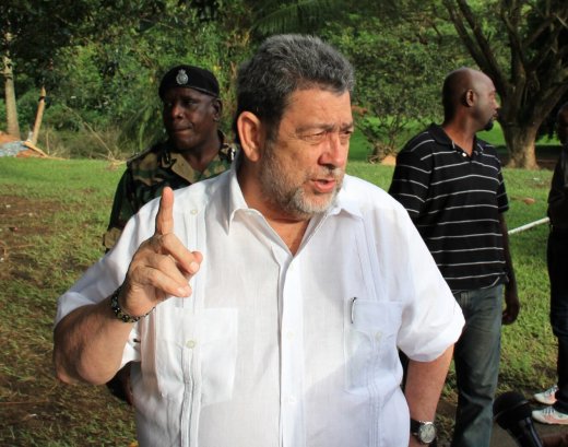 Prime Minister Ralph Gonsalves gestures as he leads government officials and the media on a tour of disaster areas on the Leeward (western) side of St. Vincent. (IWN photo) 