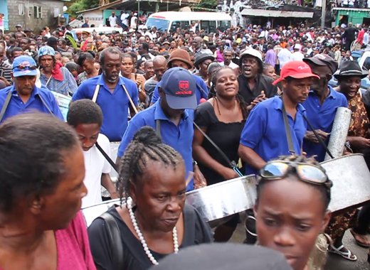 There was a lively procession from the church to the cemetery on Saturday.  (IWN image)