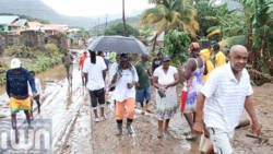 Minister of Works, Sen. Julian Francis says the clean up after the Christmas floods is incomplete. (IWN image)