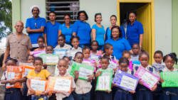 Members of Rise Up Bequia and students of the Fitz Hughes Primary School.