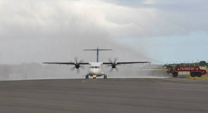 The LIAT aircraft receives the traditional spraying of water as it arrives in Antigua. (Photo: LIAT/Facebook)