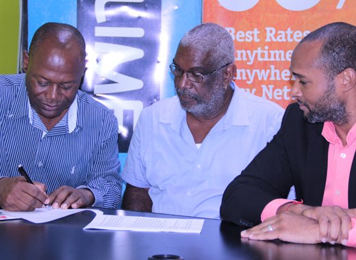 CEO of the CDC, From left: Ashford Wood, Chairman of the CDC, Denis Ambrose, and Manager of LIME, Leslie Jack, at the signing ceremony. (IWN photo)