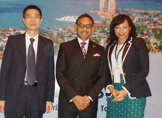 Minister Vasant Bharat, centre, Zeng Kaizhang, president, CCPIT Guangzhou, left, and Racquel Moses, President invest.