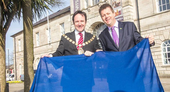 Dr Christopher Stange, Hon. Consul for St. Vincent and the Grenadines to Northern Ireland, right, and Councillor Stephen McIlveen, mayor of Ards with the Commonwealth Flag.