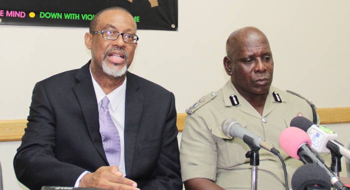 Director of Public Prosecution, Colin Williams, left, and Commissioner of Police, Michael Charles, at the launch of the booklet. (IWN photo)
