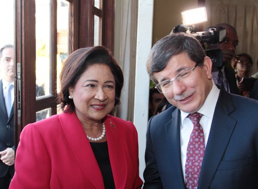 Prime Minister of Trinidad and Tobago, Kamla Persad- Bissessar arrives at the CARICOM summit on Monday. (IWN photo)