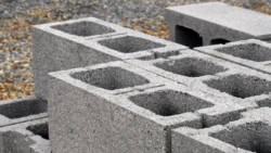 Minister of Housing Montgomery Daniel says the disaster relief is being hampered by a scarcity of concrete brick. (Internet photo) 