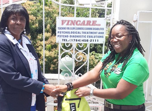 Veronica Daniel, Vincare Therapeutic Learning Centre, left, and LIMEs Nikala Williams.
