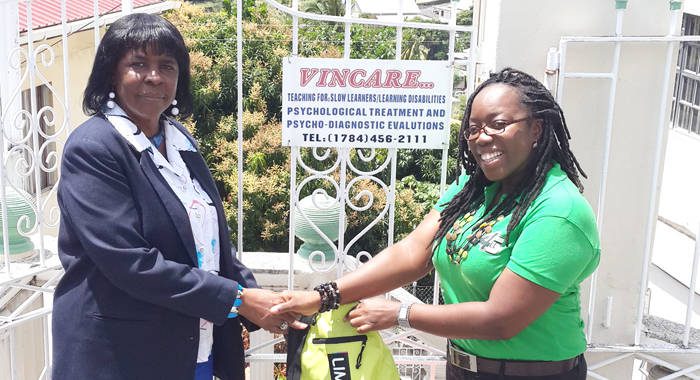 Veronica Daniel, Vincare Therapeutic Learning Centre, left, and LIMEs Nikala Williams.