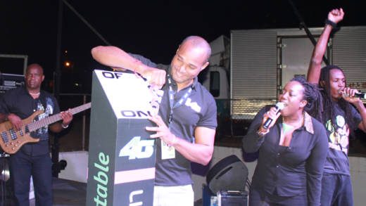 General Manager of LIME Leslie Jack flips the 4G switch as Marketing and Corporporate Communications Manager Nikala Williams does the count down.