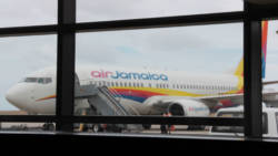 An elderly female passenger died on board this Air Jamaica aircraft as it flew from Trinidad to Barbados on Saturday. (IWN Photo)