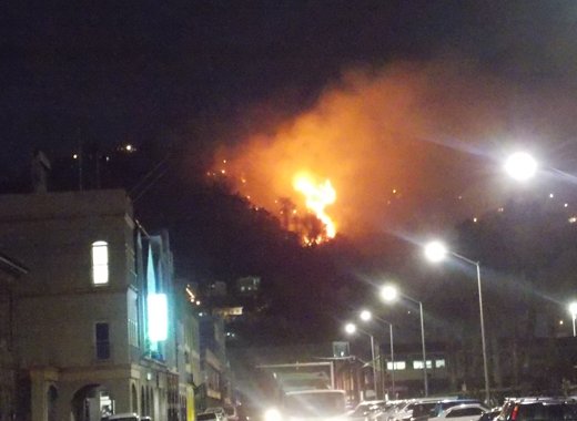 The large bush fire, pcitured here from downtown Kingstown, continued into Monday night.