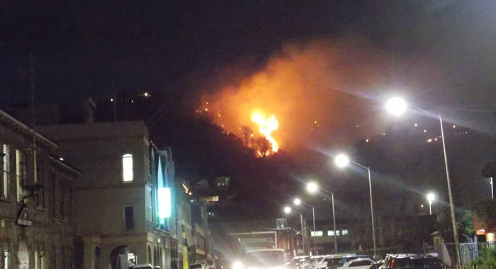 The large bush fire, pcitured here from downtown Kingstown, continued into Monday night.