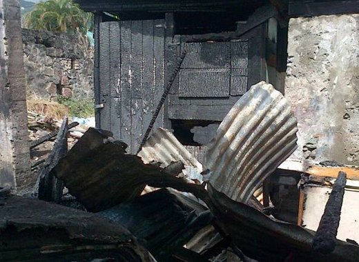 The remains of the house where the toddler died. (Photo: SVGTV/Facebook) 